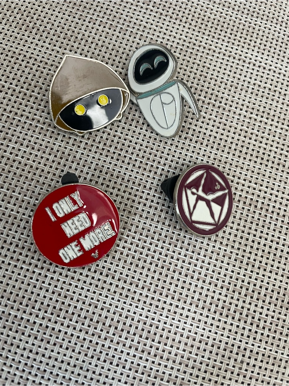 Lot of 4 Disney Parks collectible trading pins with Mickey-shaped rubber backs.